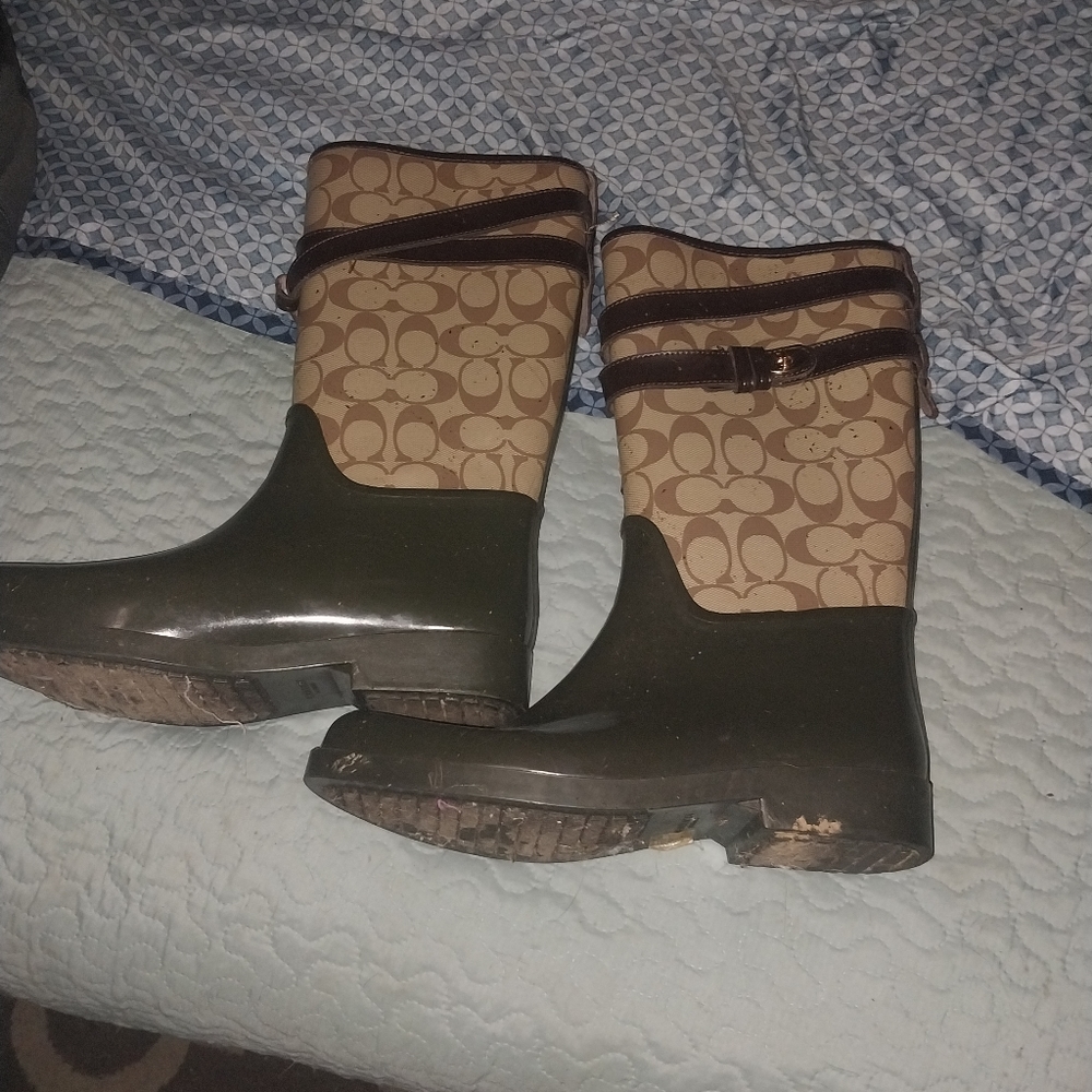 A DEB coat that is XL n a pair of Coach rain boots